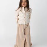 Donsje Nolien Bow trousers in Vintage Rose, worn by a child, front view