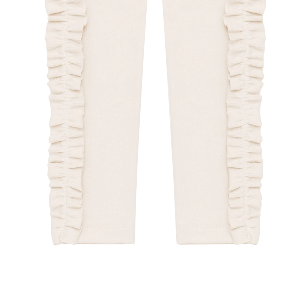 Donsje Audun leggings in Macaroon, close-up of the side ruffles
