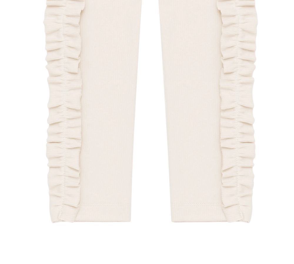 Donsje Audun leggings in Macaroon, close-up of the side ruffles