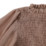 Donsje Janice dress in Rose Brown, close-up of the smocked bodice and neckline