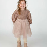 Donsje Janice dress in Rose Brown, worn by a child with beige boots, front view