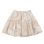 Donsje Kubwa skirt in Soft Powder with White Blossom, front view with floral details
