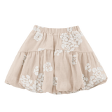 Donsje Kubwa skirt in Soft Powder with White Blossom, front view with floral details