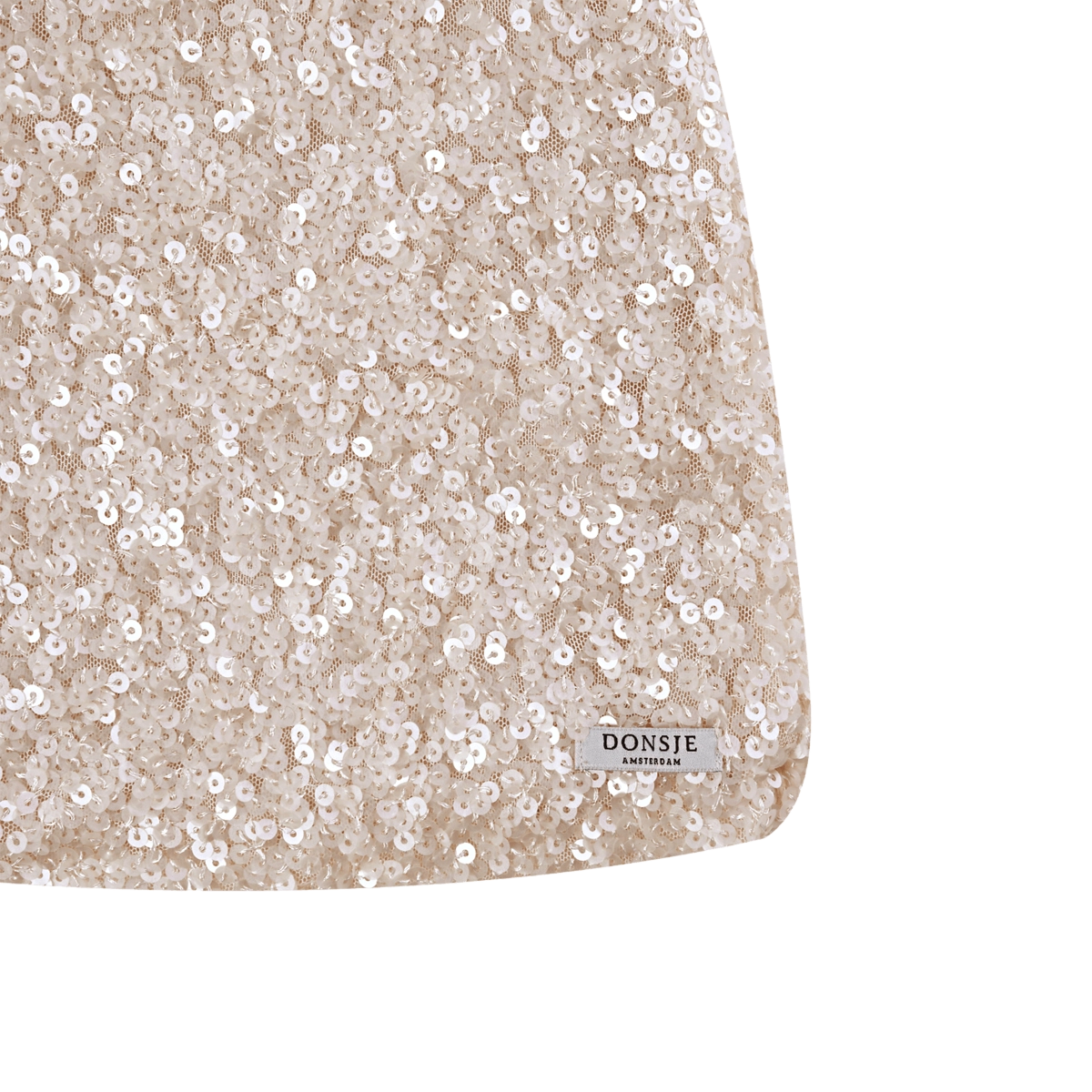 Donsje Lizonne dress in Misty Rose, close-up of the sequins and brand label