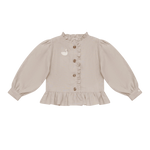 Donsje Siles Swan blouse in Soft Taupe, front view with ruffle and swan details