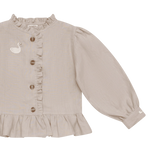 Donsje Siles Swan blouse in Soft Taupe, close-up of the front and sleeve