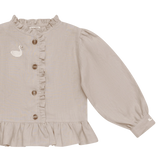 Donsje Siles Swan blouse in Soft Taupe, close-up of the front and sleeve
