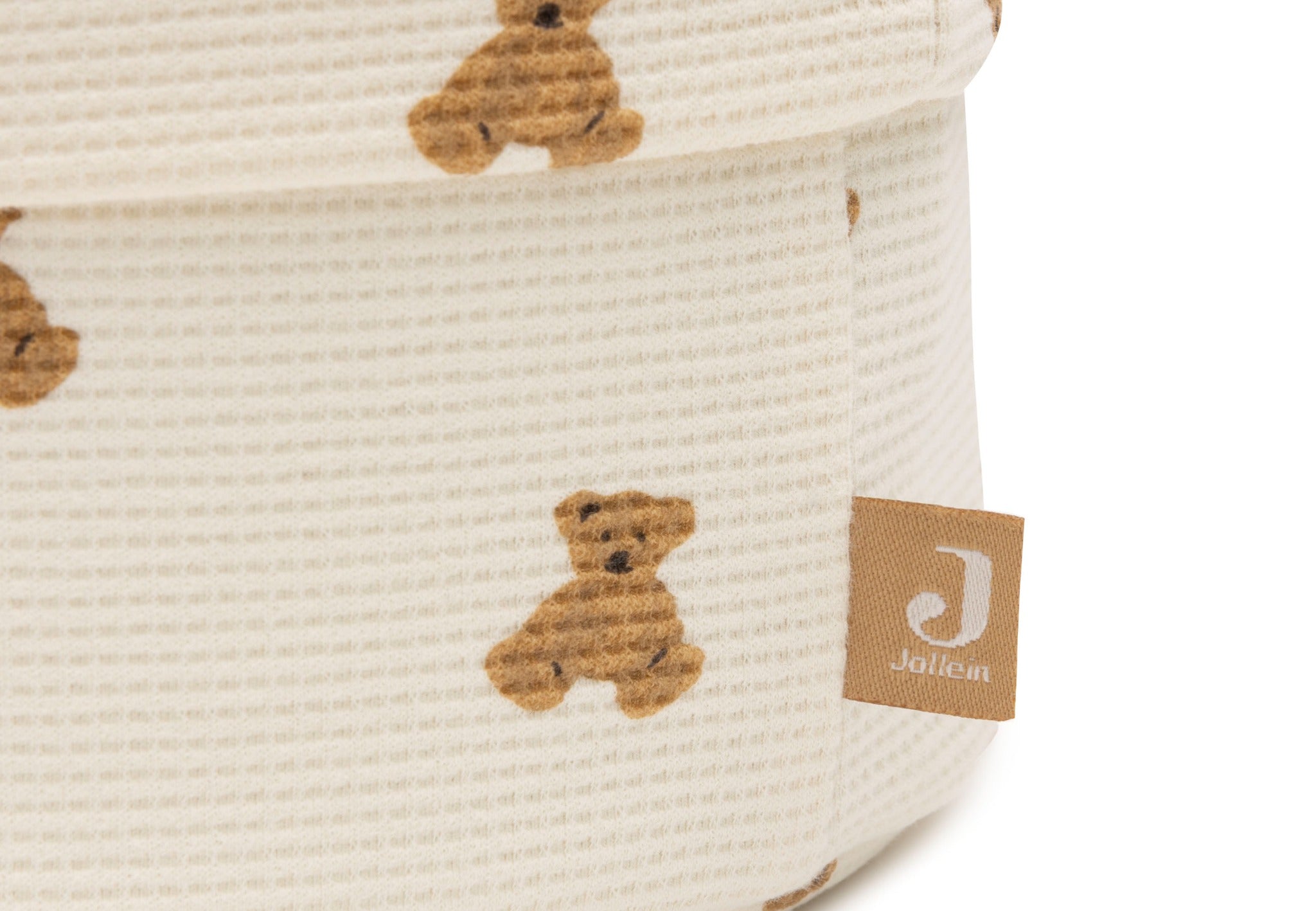 Close-up of the teddy bear print and waffle texture on the Jollein Mini Teddy Bear changing table basket