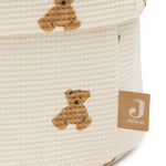 Close-up of the teddy bear print and waffle texture on the Jollein Mini Teddy Bear changing table basket