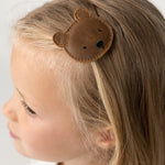 Donsje Josy Classic Bear hairclip in Cognac Classic Leather, worn in a child's hair
