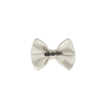 Donsje Angeline bow hairclip in Off White Metallic Leather, back view showing the metal clip