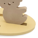 Close-up of a koala figure fitted into a yellow floating base from the Jollein Kangaroots bath foam playset