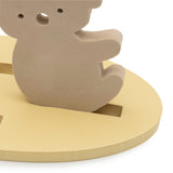 Close-up of a koala figure fitted into a yellow floating base from the Jollein Kangaroots bath foam playset
