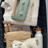 My Little Morphee Childrens Sleep and Meditation Box with other kids items in a suitcase