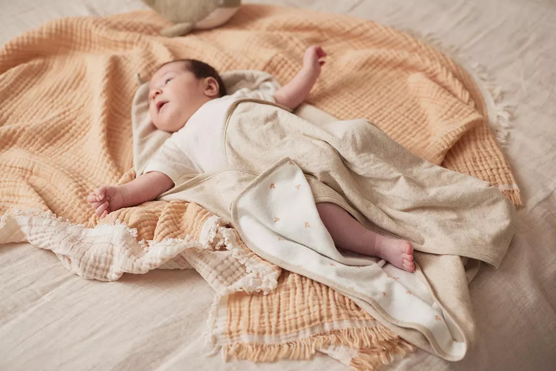 Baby on Jollein Muslin Blanket with Fringe 75x100cm Moonstone/Ivory