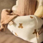 Jollein Little Waffle Mini Teddy Bear pouch with towels and a brush, angled view
