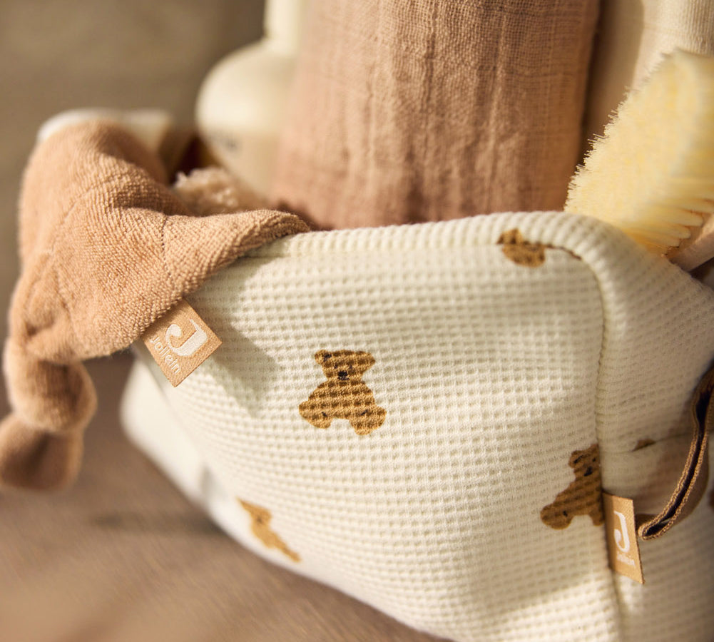Jollein Little Waffle Mini Teddy Bear pouch with towels and a brush, angled view