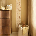Jollein Kangaroots growth chart and stuffed animal displayed in a nursery