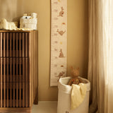 Jollein Kangaroots growth chart and stuffed animal displayed in a nursery