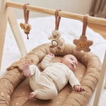 baby with Jollein wooden baby gym