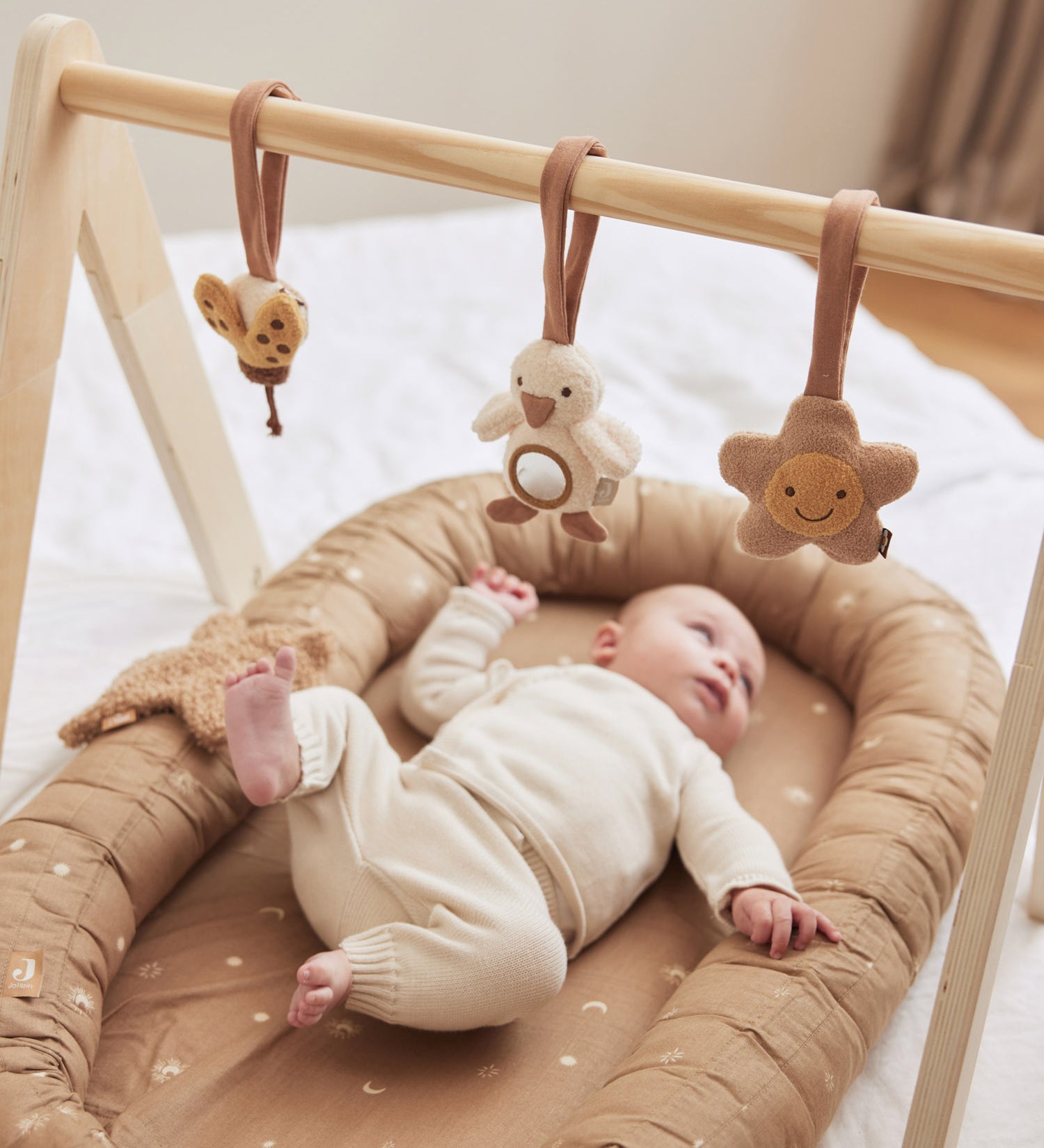 baby with Jollein wooden baby gym