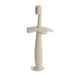 Mushie flower training toothbrush shifting sand