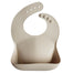 mushie silicone bib shifting sand