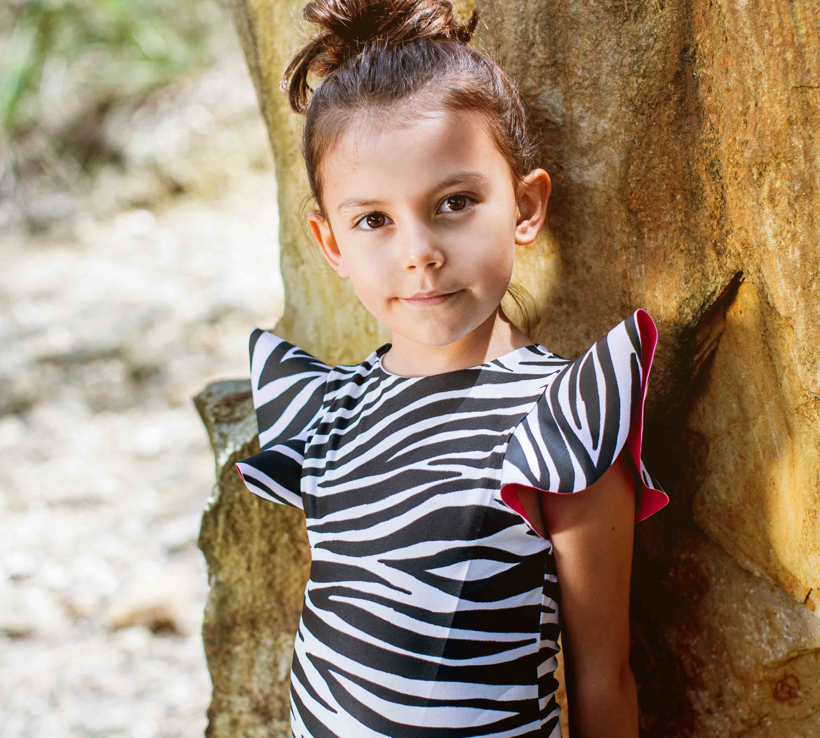 Girl wearing Pepita and me Picabuey Negro swimsuit