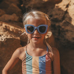 Kids wearing Salted Stories Cat Eye sunglasses in Persian Violet lifestyle image