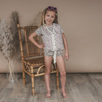 Salted Stories Sparkly Flowers floating vest in White Swan back product image