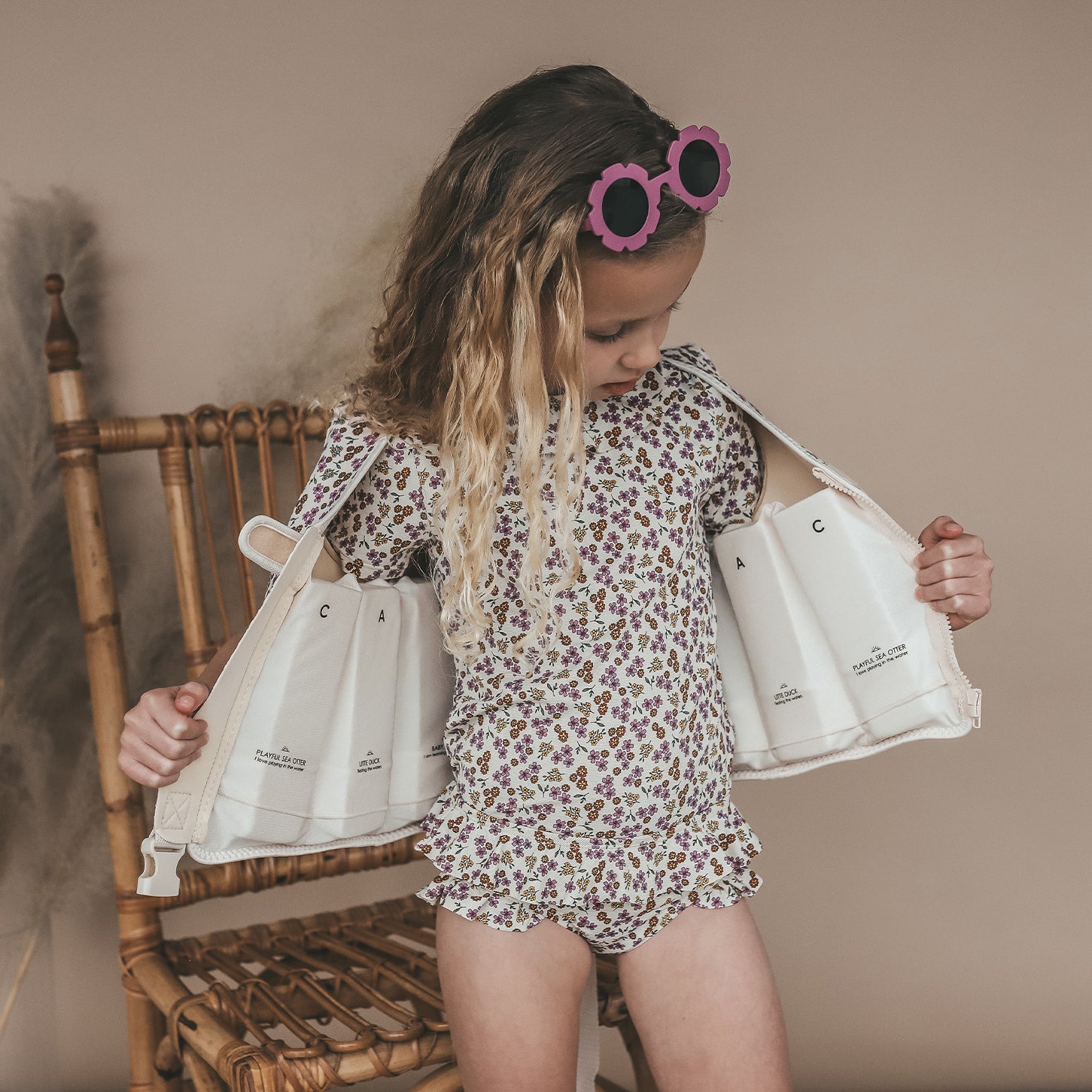 Salted Stories Sparkly Flowers kids swim vest in White Swan detail image