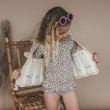 Salted Stories Sparkly Flowers kids swim vest in White Swan detail image