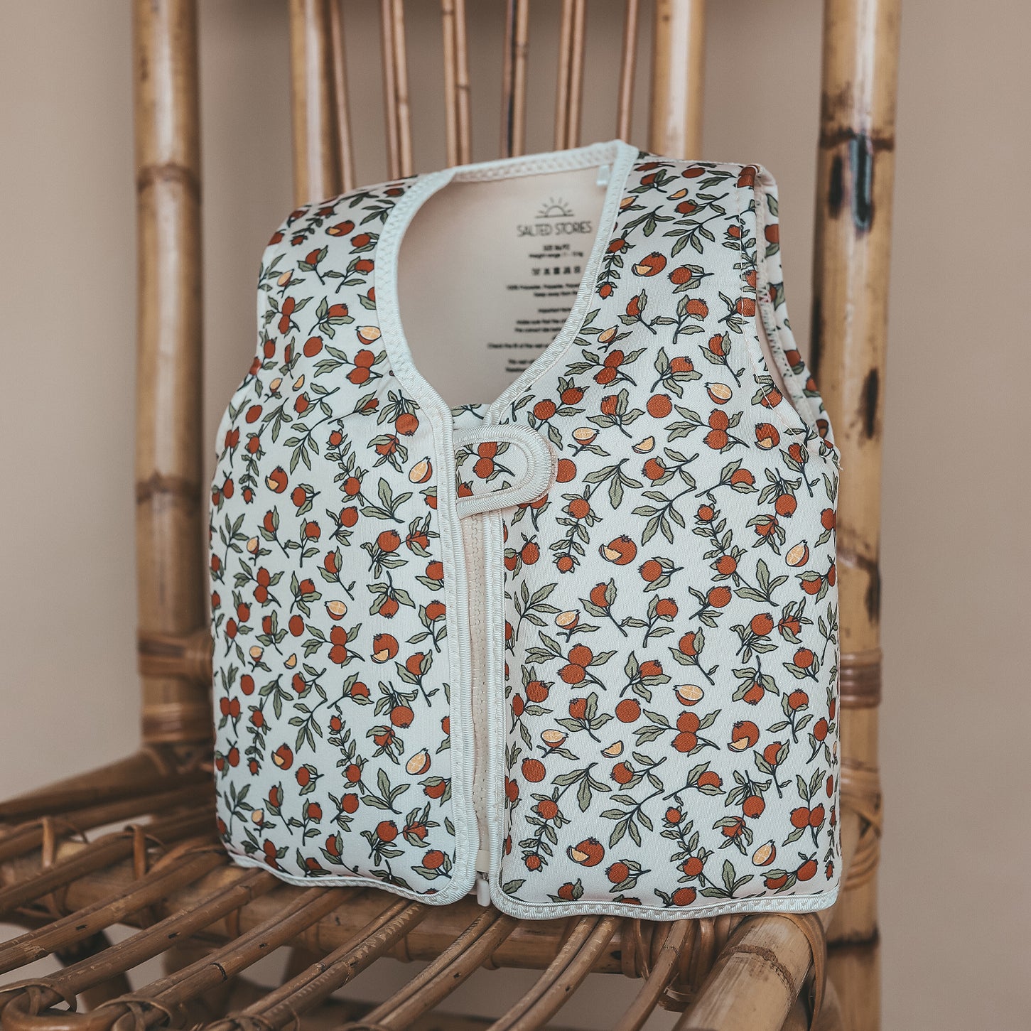 Salted Stories Pomegranate floating vest in White Swan pool lifestyle image