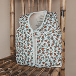Salted Stories Pomegranate floating vest in White Swan pool lifestyle image