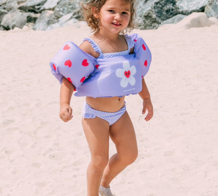 Girl with Swim Essentials Puddle Jumper  Flower Heart