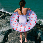 Girl with Swim Essentials 90cm Swim Ring Lilac Hearts Transparent